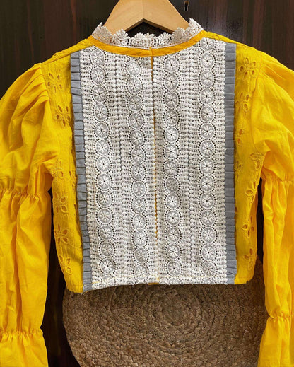 yellow high neck blouse