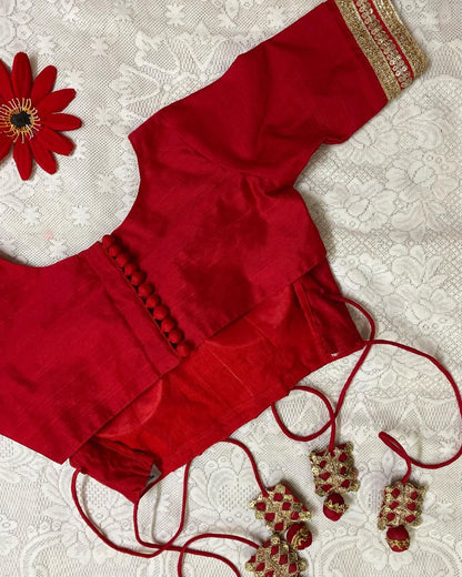 red backless blouse image