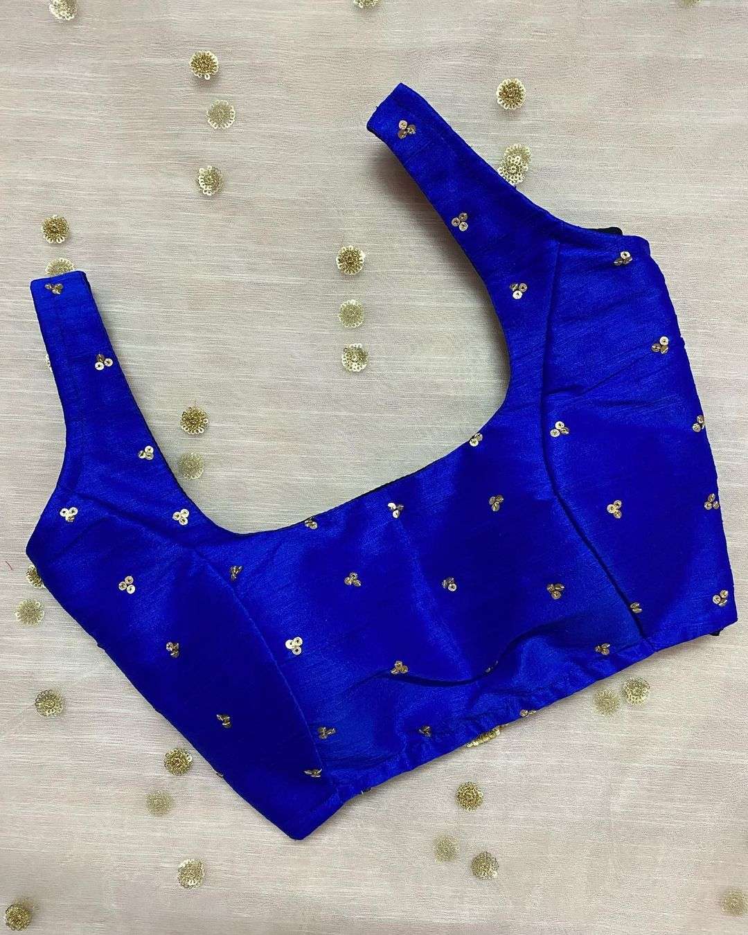 blue sleeveless blouse image