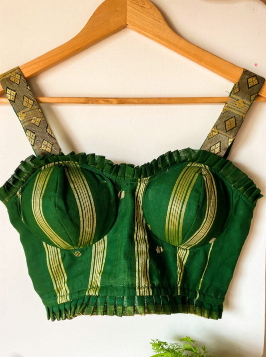 green sleeveless blouse image