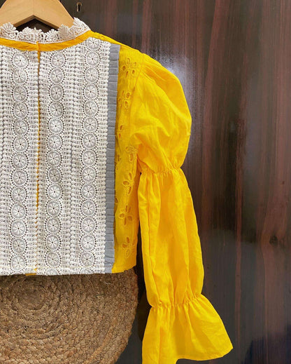 yellow high neck blouse