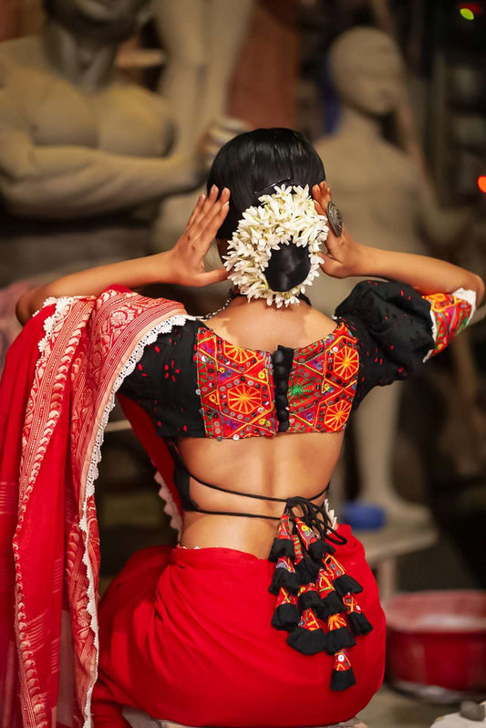 red and black backless blouse image