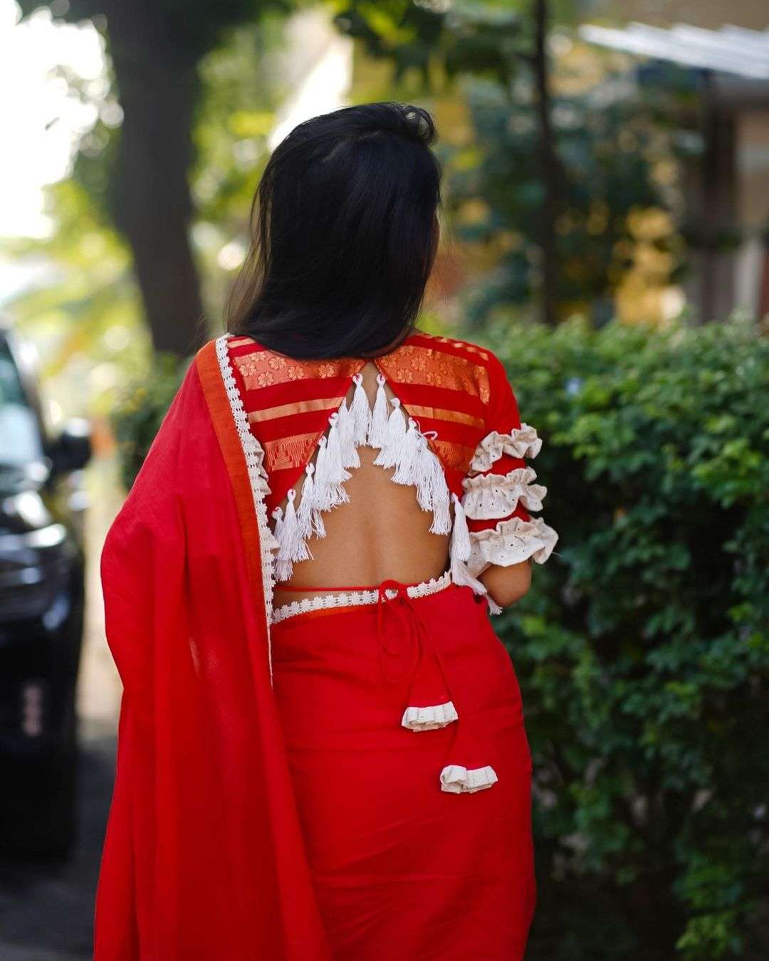 red ruffle blouse image