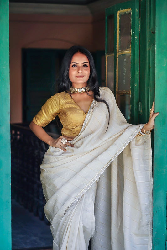 Nur Jahan in Off White Saree